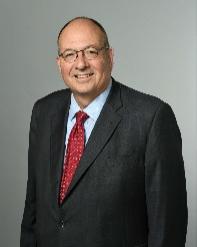 A person wearing a suit and tie

Description automatically generated with medium confidence